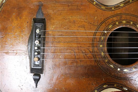 An antique guitar, label for J. Turner